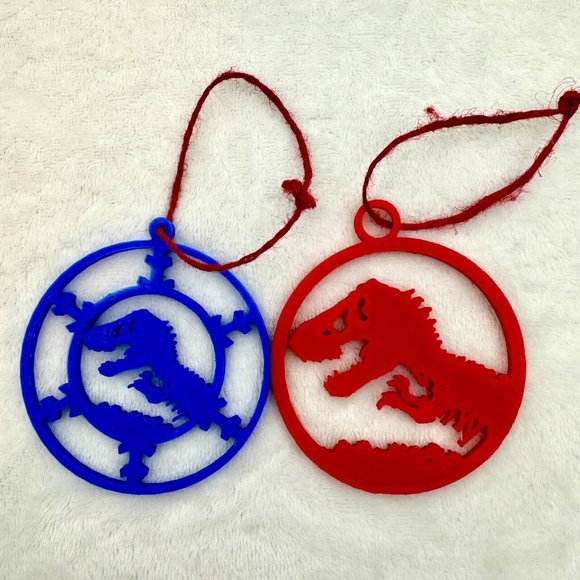Two (2) Jurassic Park T-Rex 3" Plastic Christmas Ornaments Red & Blue - Picture 2 of 4